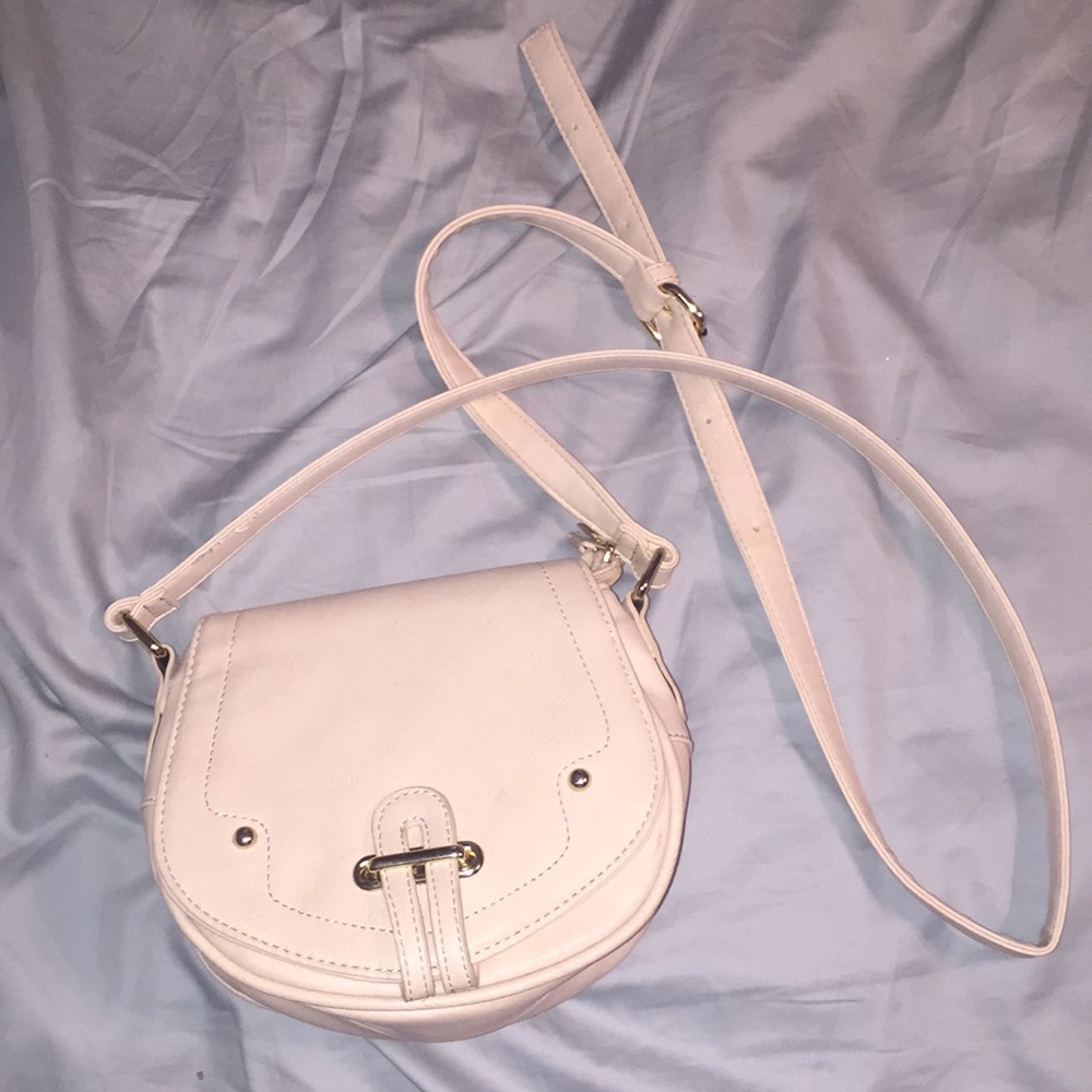 Charming Charlie’s tan cross body purse